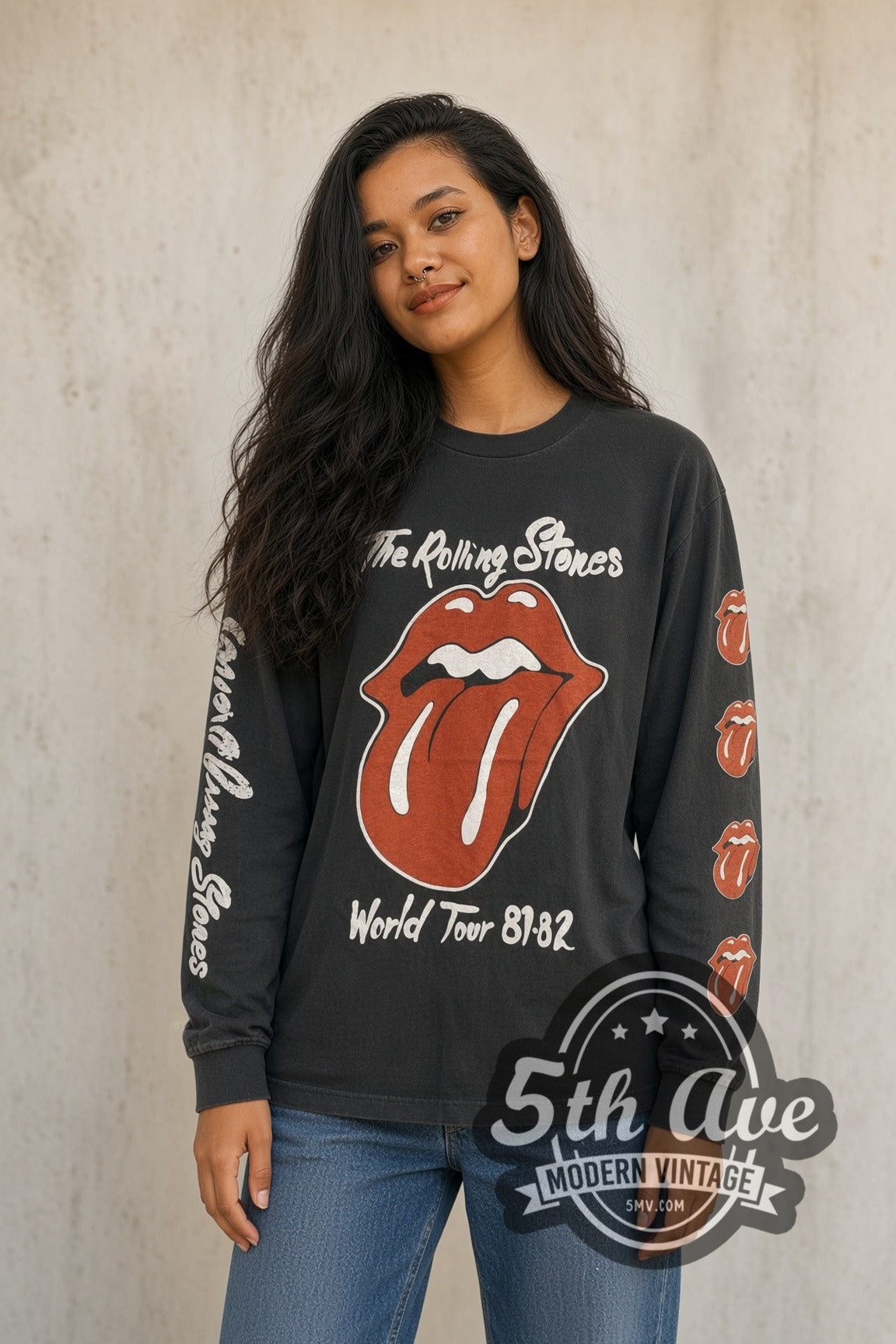 Woman wearing faded black The Rolling Stones World Tour 81-82 Tongue & Globe vintage band t-shirt