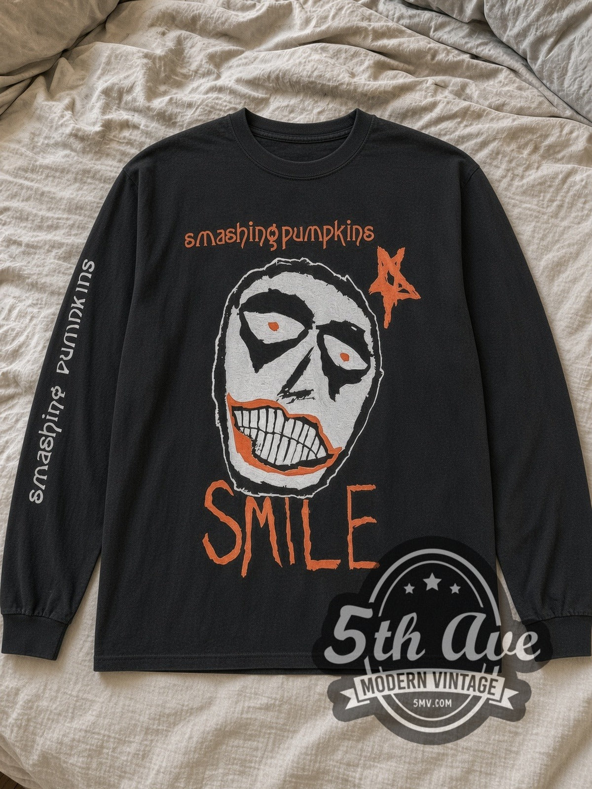 Black The Smashing Pumpkins Smile Vintage Band Long Sleeve T-Shirt laid flat on a linen bed