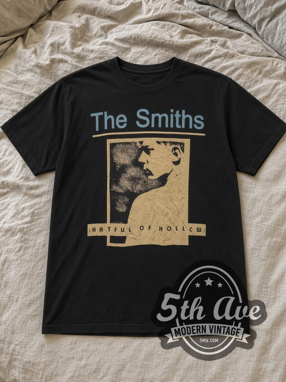 Black The Smiths Hatful of Hollow Album Art Vintage Band T-Shirt laid flat on a linen bed