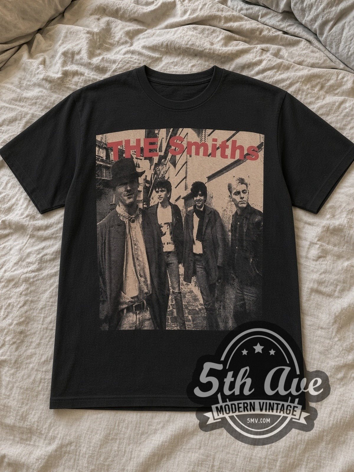 Black The Smiths Sepia Alleyway Band Photo Red Logo Vintage Band T-Shirt laid flat on a linen bed