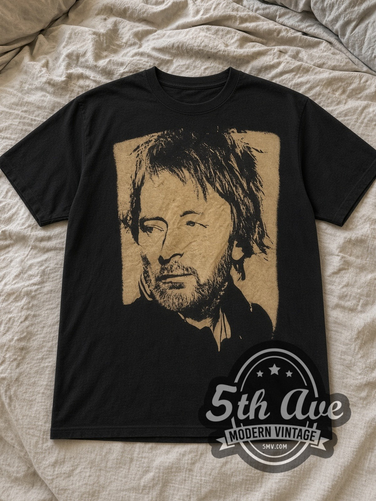 Black Thom Yorke Vintage Band T-Shirt laid flat on a linen bed