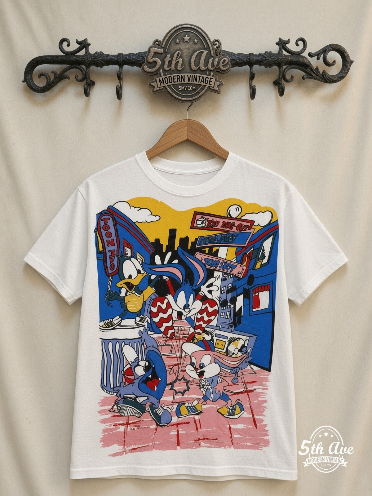 Tiny Toon Adventures Toon Town Crew all over print vintage cartoon t-shirt front on cream 5th Ave rack