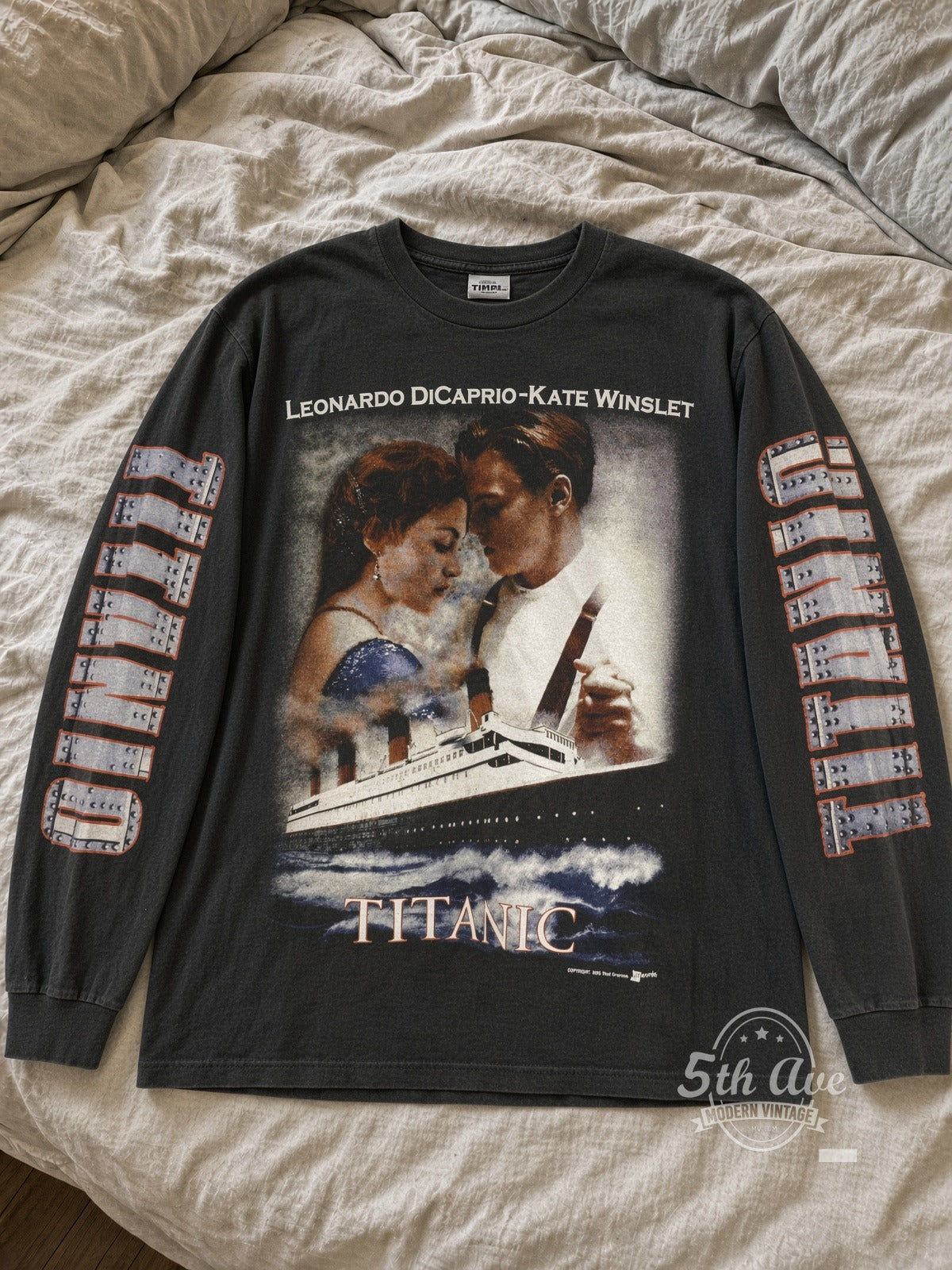 Titanic DiCaprio and Winslet Nothing on Earth Long Sleeve vintage tee laid flat on bed