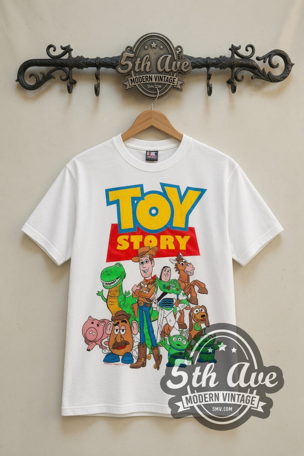 Toy Story Cast Group Logo movie tee in white, front view on a display rack