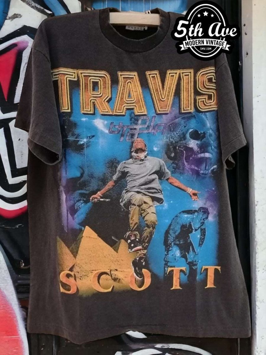 Travis selling Scott tee