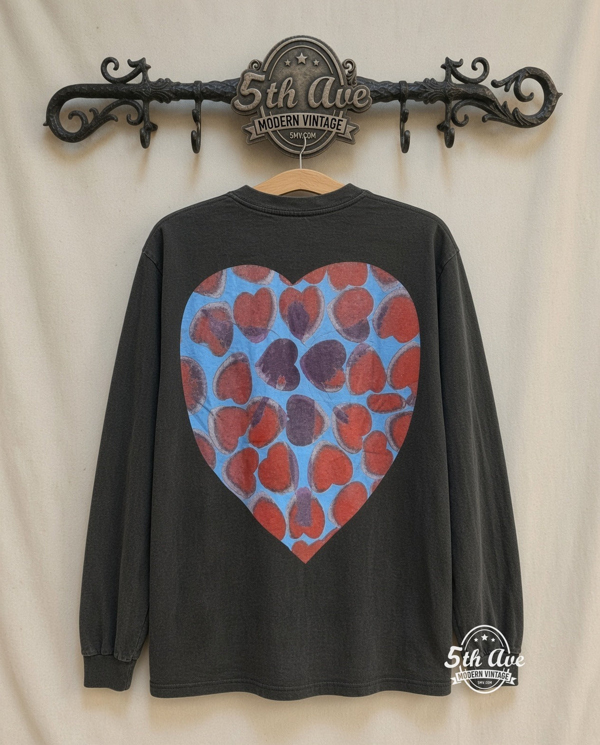 Nirvana Heart-Shaped Box Long Sleeve T-Shirt: Vintage Grunge Style with Iconic Graphic vintage tee on 5th Ave cream rack — back