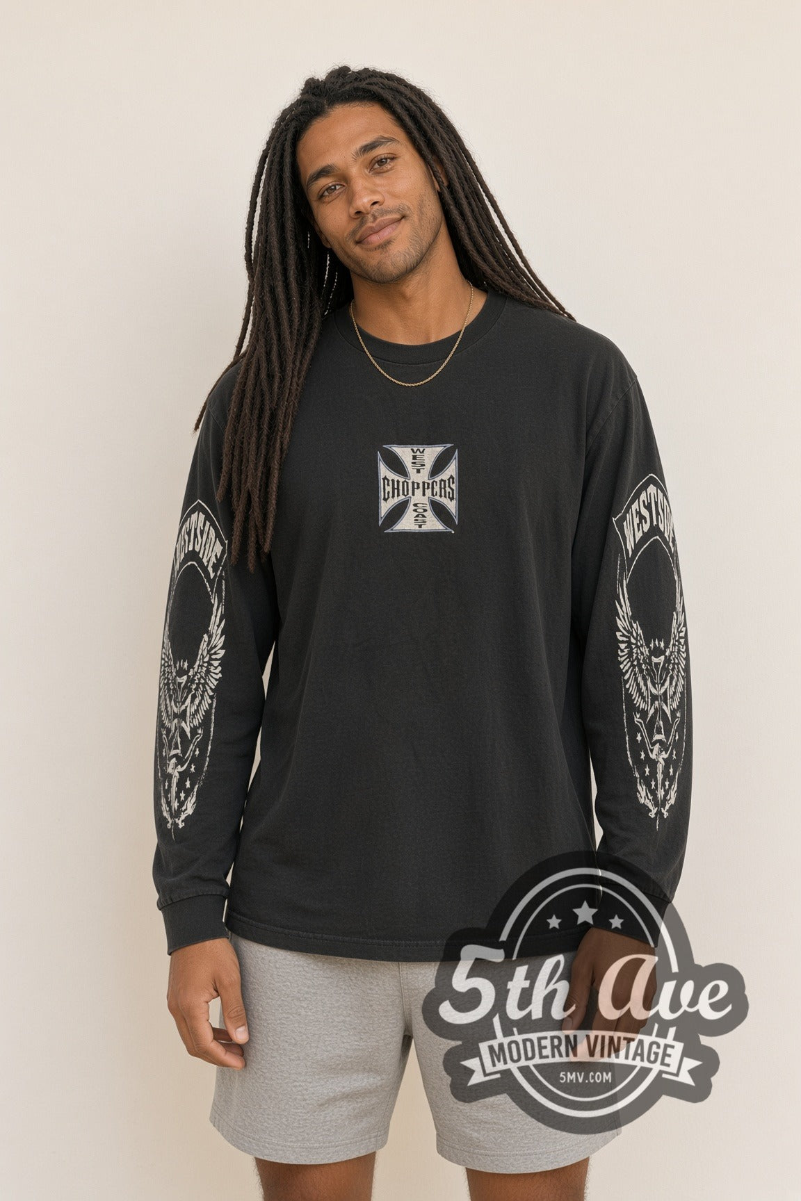 Model wearing West Coast Choppers Blue Iron Cross Eagle Sleeves Long Sleeve vintage motorsports tee