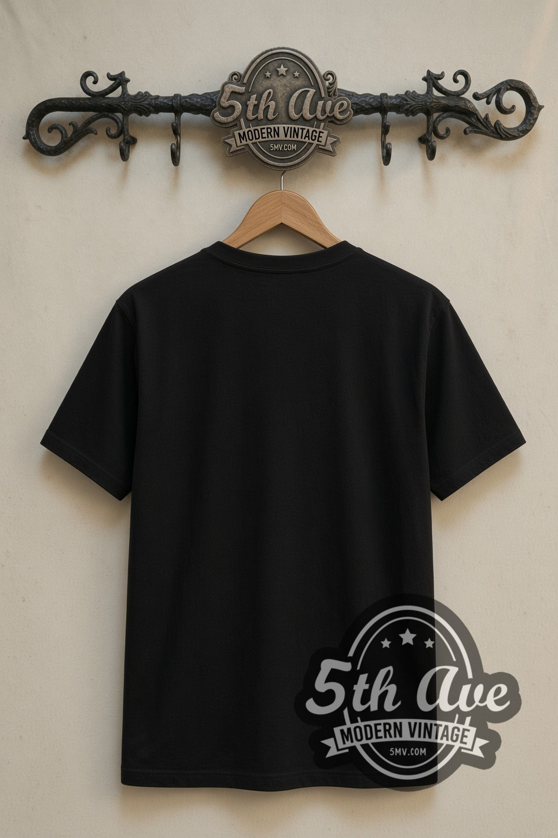 Plain black back of Wolverine Black Timber Claws double stitched tee on rack