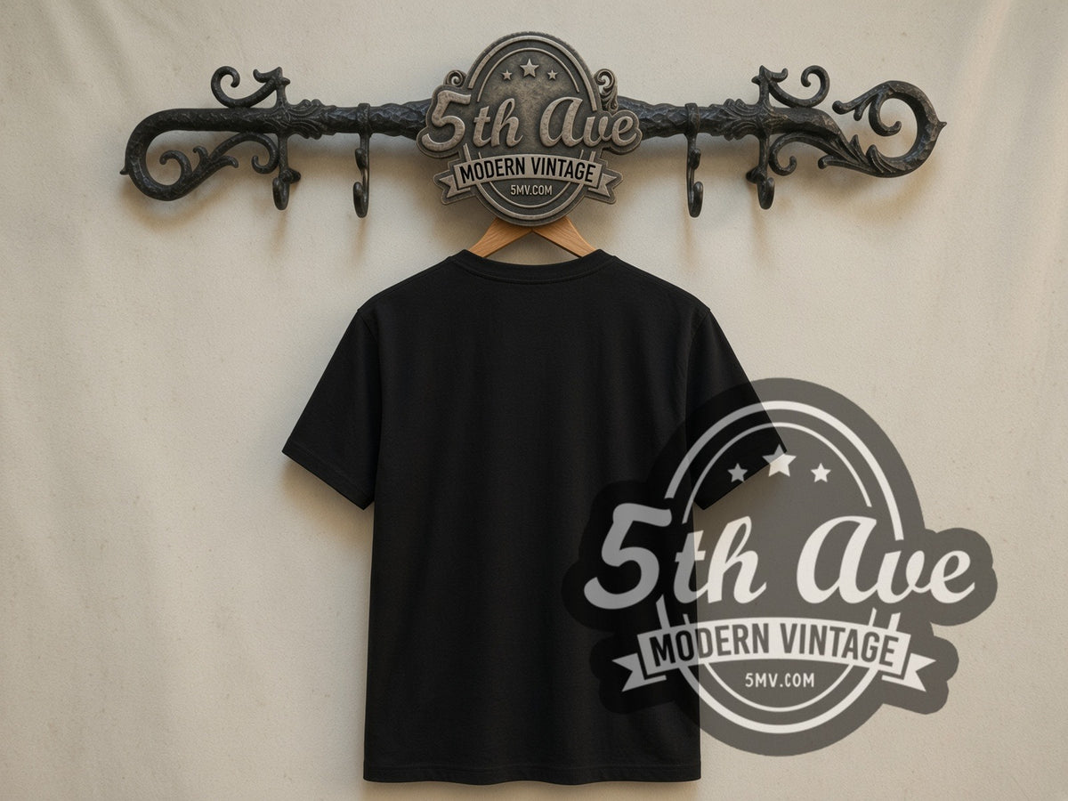 Plain black back of Wonder Woman 1984 Golden Armor double stitched tee on rack