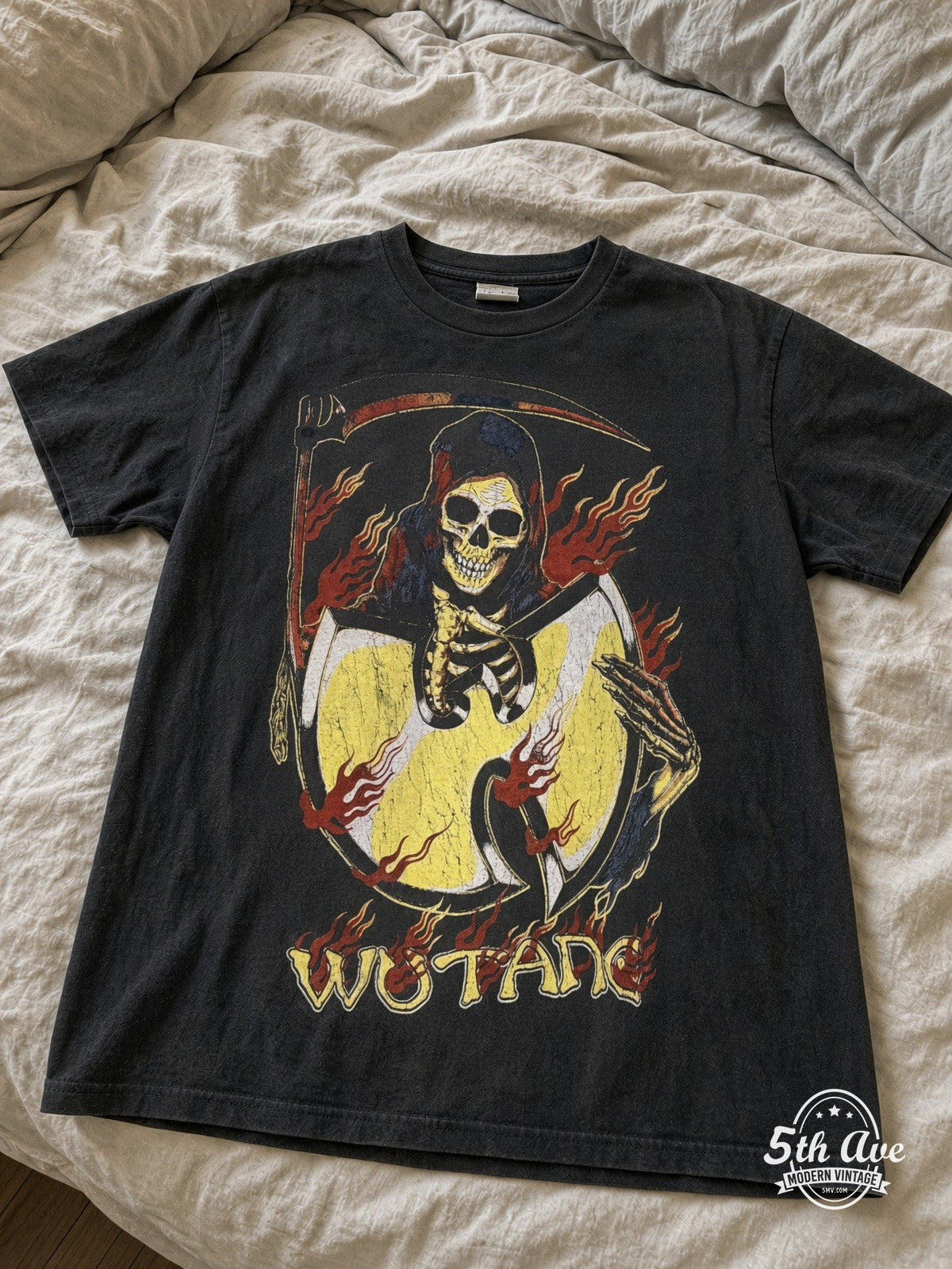 Wu-Tang Clan CREAM Reaper vintage tee laid on bed
