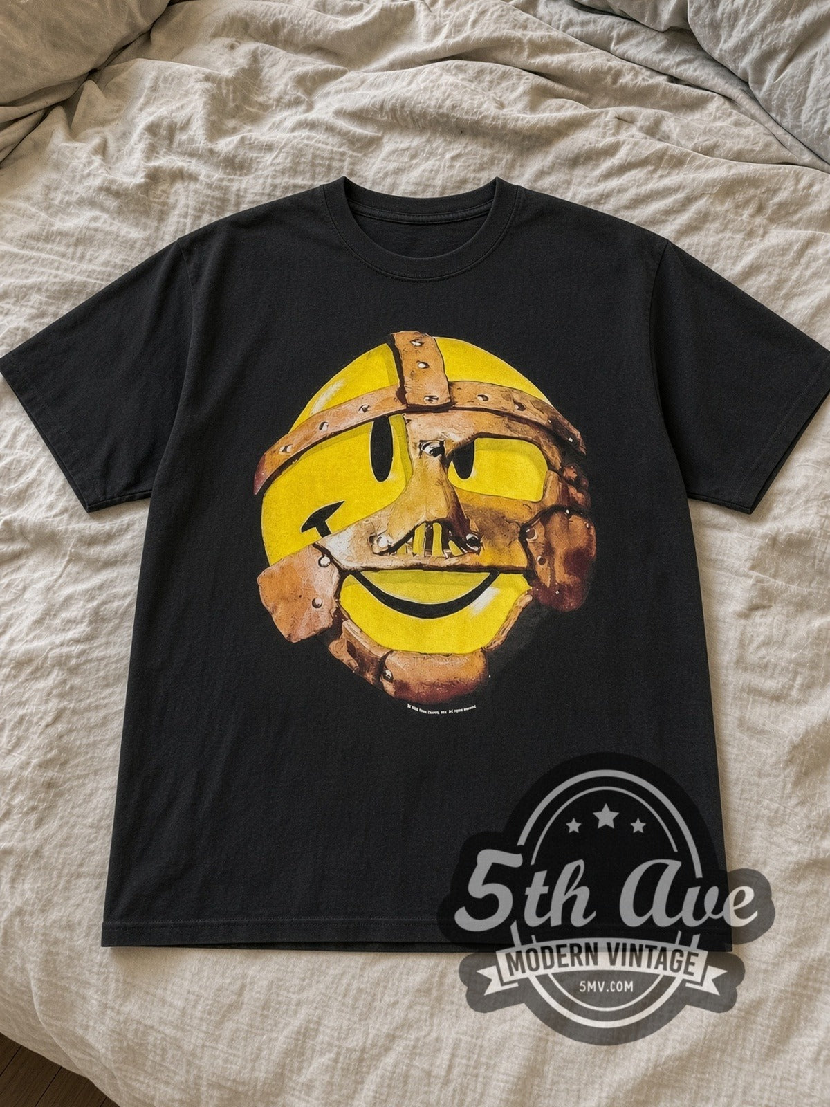 Black WWF Have a Nice Day Vintage Wrestling T-Shirt laid flat on a linen bed