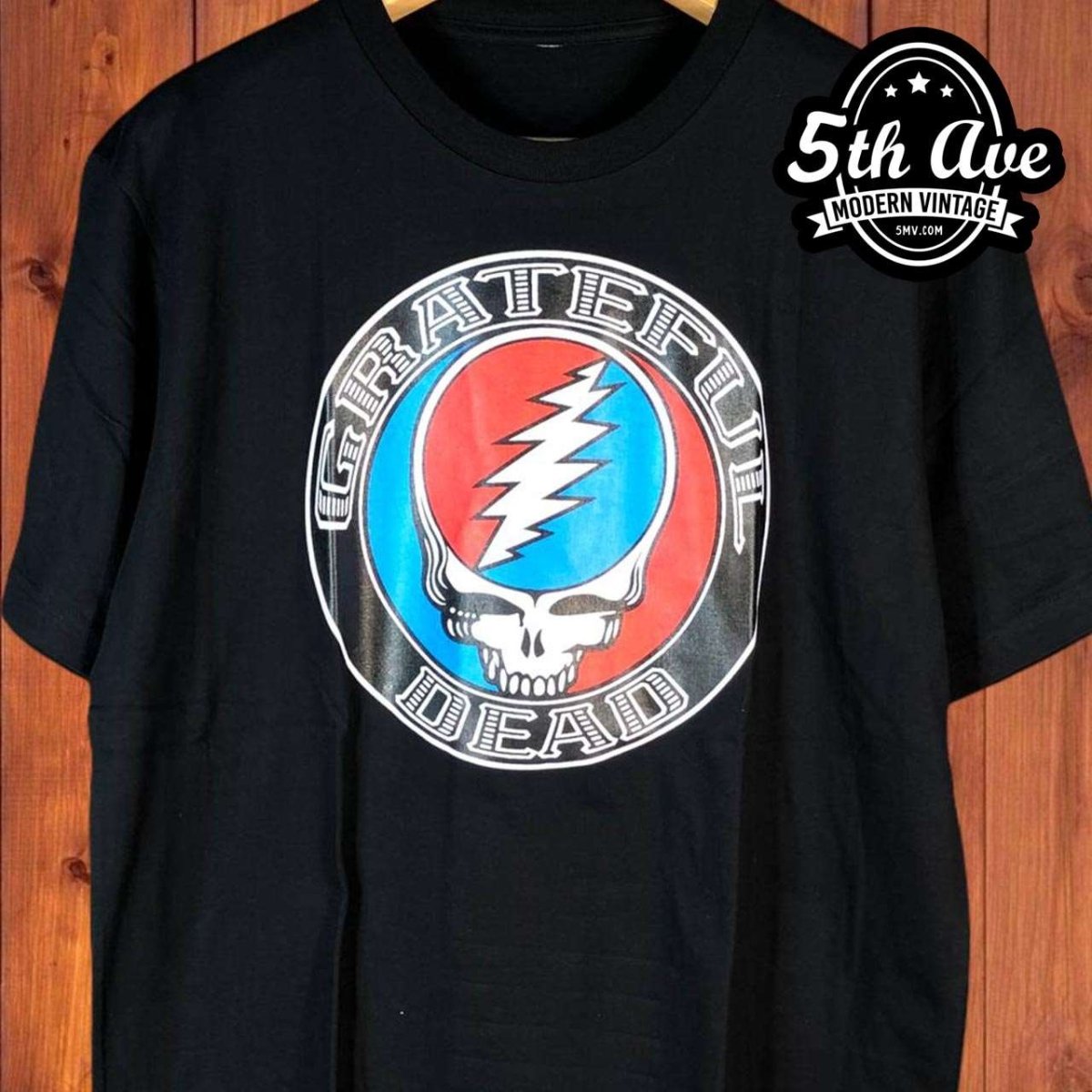 Classic Black Grateful Dead T-Shirt with Blue, Red, and White Stealie Logo - Vintage Band Shirts