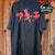 Neo Tokyo Ignites: Akira Gun Design t shirt with Explosive Japanese Flair - Vintage Band Shirts